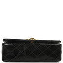 Chanel Classic Maxi Logo Full Flap Bag Black Quilted Patent Leather With 24K Gold-Plated Hardware