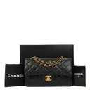 Chanel Classic Small Double Flap Bag In Black Quilted Lambskin And 24K Gold-Plated Hardware