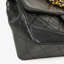 Chanel Classic Flap Bag Black Lambskin 24k Gold-Plated Hardware