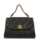 Chanel Flap Bag In Black Quilted Lambskin With Chain Top Handle And 24K Gold-Plated Hardware, 1994-1996