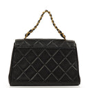 Chanel Flap Bag In Black Quilted Lambskin With Chain Top Handle And 24K Gold-Plated Hardware, 1994-1996