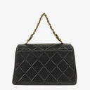 Chanel Flap Bag In Black Quilted Lambskin With Chain Top Handle And 24K Gold-Plated Hardware