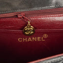 Chanel Flap Bag In Black Quilted Lambskin With Chain Top Handle And 24K Gold-Plated Hardware
