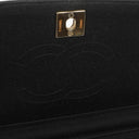 Sac à rabat demi-lune Chanel en jersey matelassé noir avec ferrures plaquées or 24K