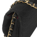 Sac à rabat demi-lune Chanel en jersey matelassé noir avec ferrures plaquées or 24K