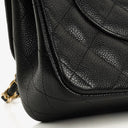 Chanel Jumbo Classic Double Flap Bag Black Quilted Caviar Gold-Tone Hardware