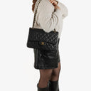 Chanel Jumbo Classic Double Flap Bag Black Quilted Caviar Gold-Tone Hardware
