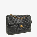 Chanel Jumbo Classic Single Flap Bag Black Quilted Lambskin 24K Gold-Plated Hardware