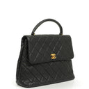 Chanel Kelly Black Quilted Caviar Leather Top Handle Bag With 24K Gold-Plated Hardware, 1996-1997