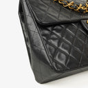 Chanel Maxi Jumbo CC Classic Single Flap Bag Black Quilted Lambskin 24K Gold-Plated Hardware