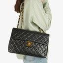 Chanel Maxi Jumbo Classic Single Flap Bag Black Quilted Lambskin 24K Gold-Plated Hardware