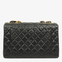Chanel Maxi Jumbo Classic Single Flap Bag Black Quilted Lambskin 24K Gold-Plated Hardware