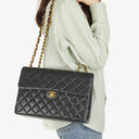 Chanel Maxi Jumbo Classic Single Flap Bag Black Quilted Lambskin 24K Gold-Plated Hardware