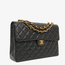 Chanel Maxi Jumbo Classic Single Flap Bag Black Quilted Lambskin 24K Gold-Plated Hardware