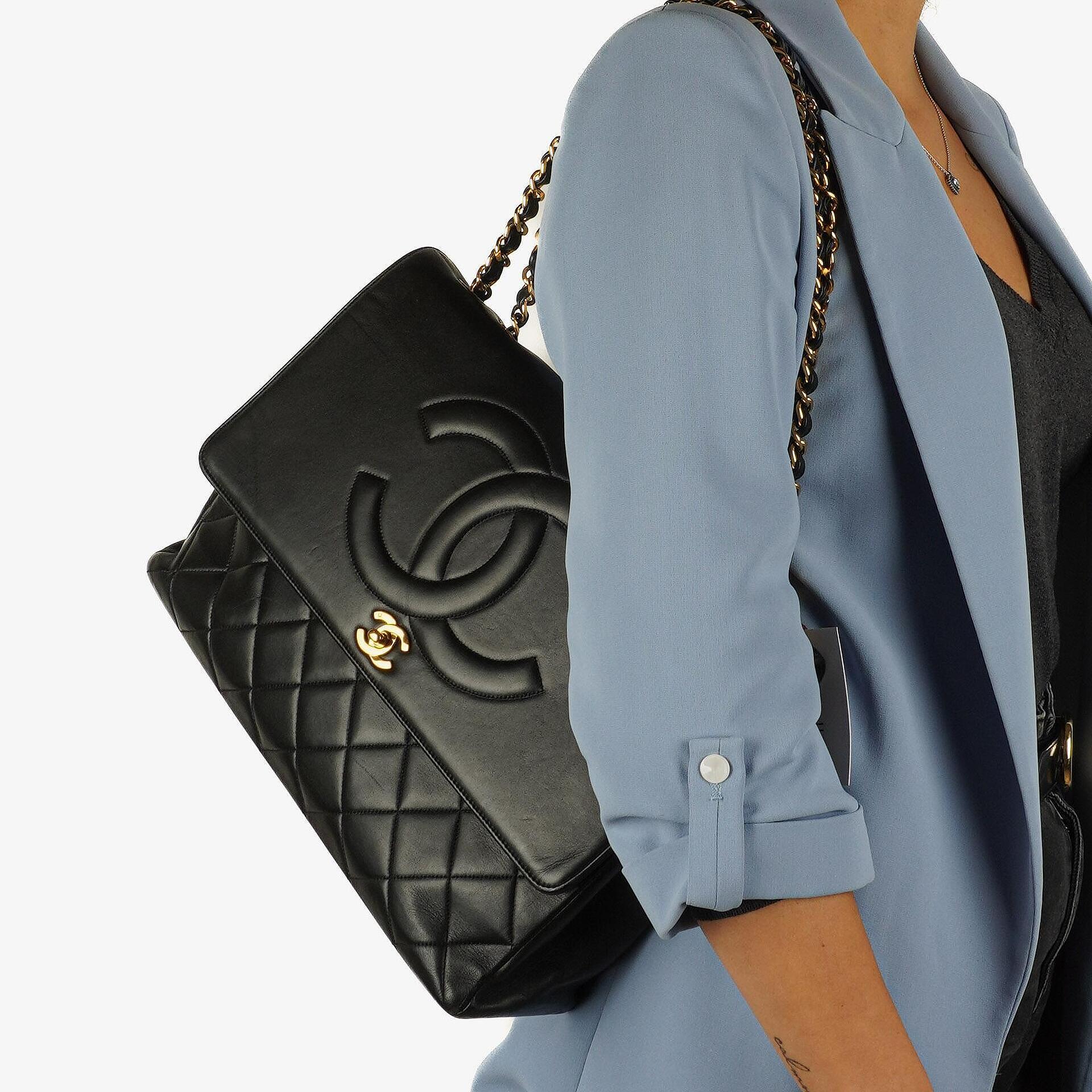 Chanel Maxi Jumbo Classic Single Flap Bag Black Quilted Lambskin 24K Gold-Plated Hardware
