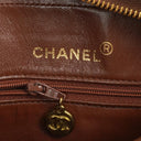 Chanel Medium Camera Tassel Brown Vertical Quilted Lambskin CC Flap Shoulder Bag 24K Gold-Plated Hardware, 1994-1996
