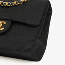Chanel Mini Quilted Square Jersey Black Flap Bag With 24K Gold-Plated Hardware