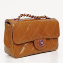 Chanel Mini Rectangular Flap Bag In Quilted Patent Leather