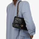 Chanel Small Classic Double Flap Bag In Black Quilted Lambskin With 24K Gold-Plated Hardware