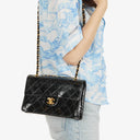Chanel Small Classic Single Flap Bag Black Patent Quilted Leather With 24K Gold-Plated Hardware