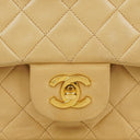 Chanel Timeless Classic Medium Double Flap Bag In Beige Quilted Lambskin And 24K Gold-Plated Hardware