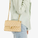 Chanel Timeless Classic Small Double Flap Bag In Beige Quilted Lambskin And 24K Gold-Plated Hardware
