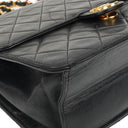 Chanel Timeless Classic Small Flap Bag In Black Quilted Lambskin And 24K Gold-Plated Hardware