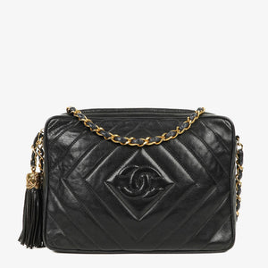Chanel Bolso Vintage Cámara con Borla CC en Piel de Cordero Negra