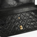 Chanel Vintage Classic Double Flap Bag in Quilted Black Lambskin with 24K Gold-Plated Hardware