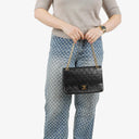 Chanel Vintage Classic Medium Double Flap Bag in Quilted Black Lambskin with 24-karat Gold-Plated Hardware