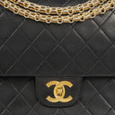 Chanel Vintage Classic Medium Double Flap Bag in Quilted Black Lambskin with 24-karat Gold-Plated Hardware