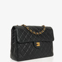 Chanel Vintage Jumbo Classic Single Flap Bag Black Quilted Lambskin With 24K Gold-Plated Hardware, 1996-1997