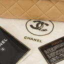 Chanel Vintage Medium Camera Tassel CC Front Flap Pocket Bag In Beige Quilted Lambskin