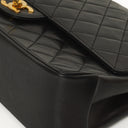 Chanel Vintage Timeless Classic Medium Double Flap Bag In Black Quilted Lambskin With 24K Gold-Plated Hardware And Mademoiselle Chain