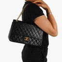 Chanel Vintage Timeless Classic Medium Double Flap Bag In Black Quilted Lambskin With 24K Gold-Plated Hardware And Mademoiselle Chain