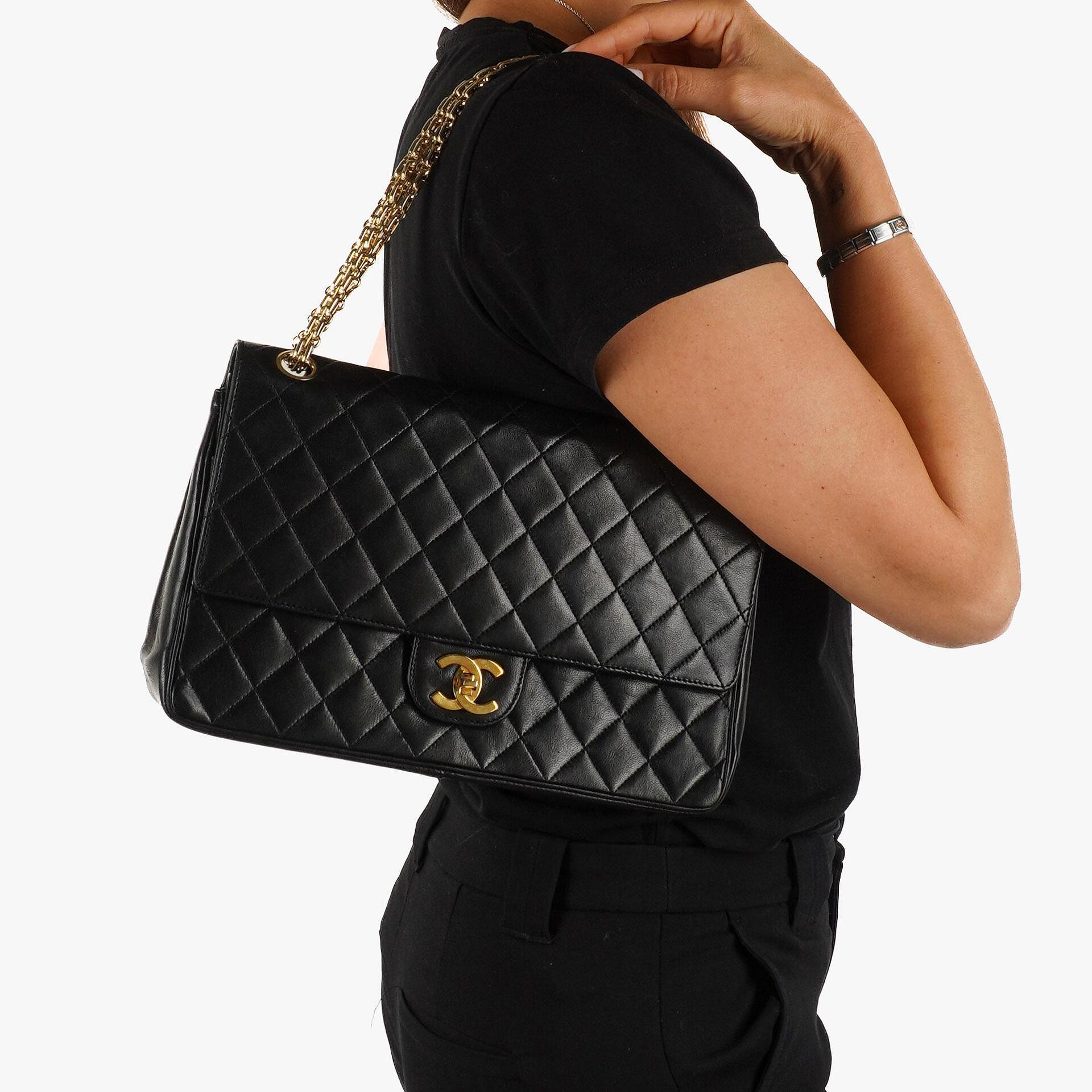 Chanel Vintage Timeless Classic Medium Double Flap Bag In Black Quilted Lambskin With 24K Gold-Plated Hardware And Mademoiselle Chain