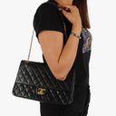 Chanel Vintage Timeless Classic Medium Double Flap Bag In Black Quilted Lambskin With 24K Gold-Plated Hardware And Mademoiselle Chain