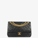 Chanel Vintage Medium Timeless Classic Double Flap Bag In Black Quilted Lambskin With 24K Gold-Plated Hardware And Mademoiselle Chain