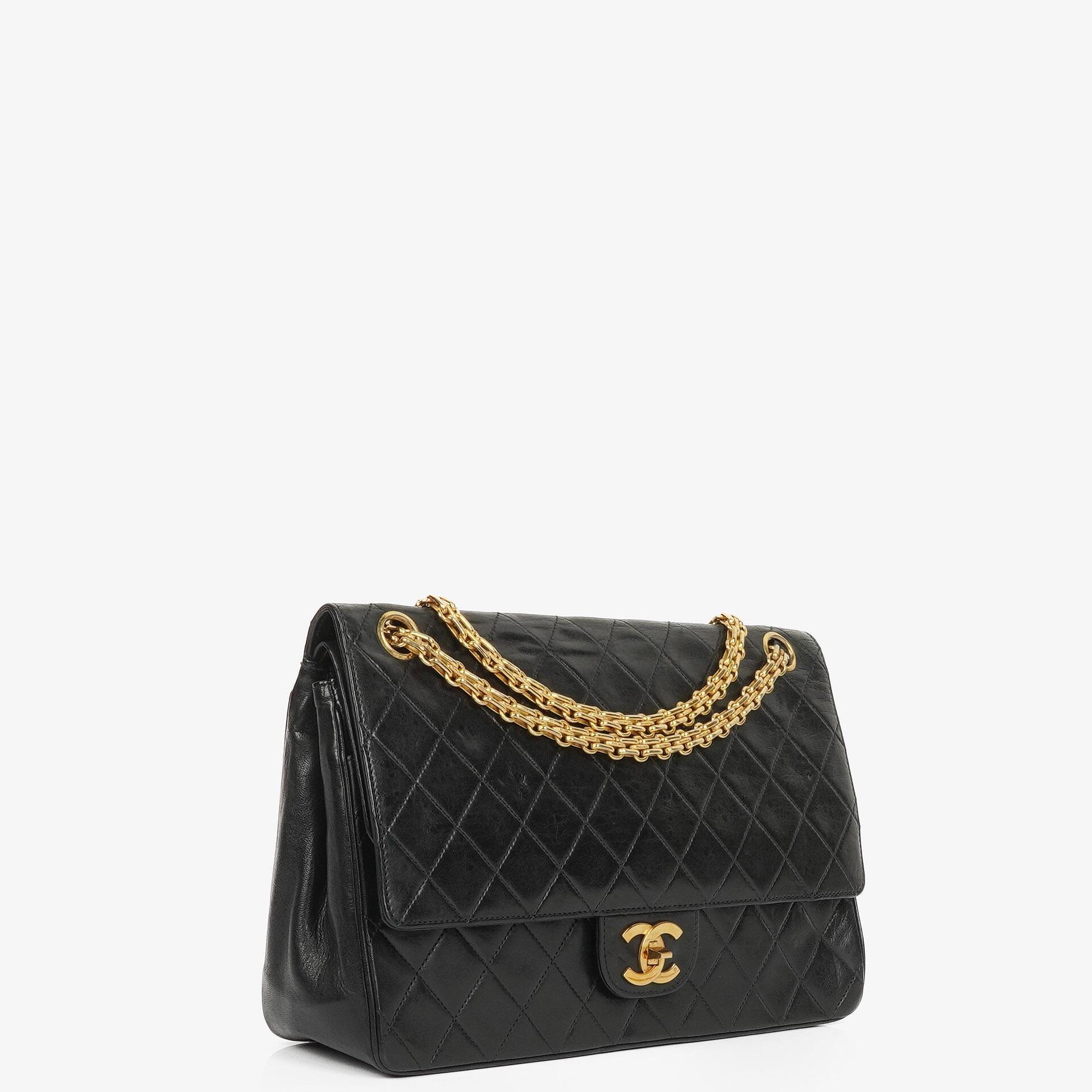 Chanel Vintage Medium Timeless Classic Double Flap Bag In Black Quilted Lambskin With 24K Gold-Plated Hardware And Mademoiselle Chain