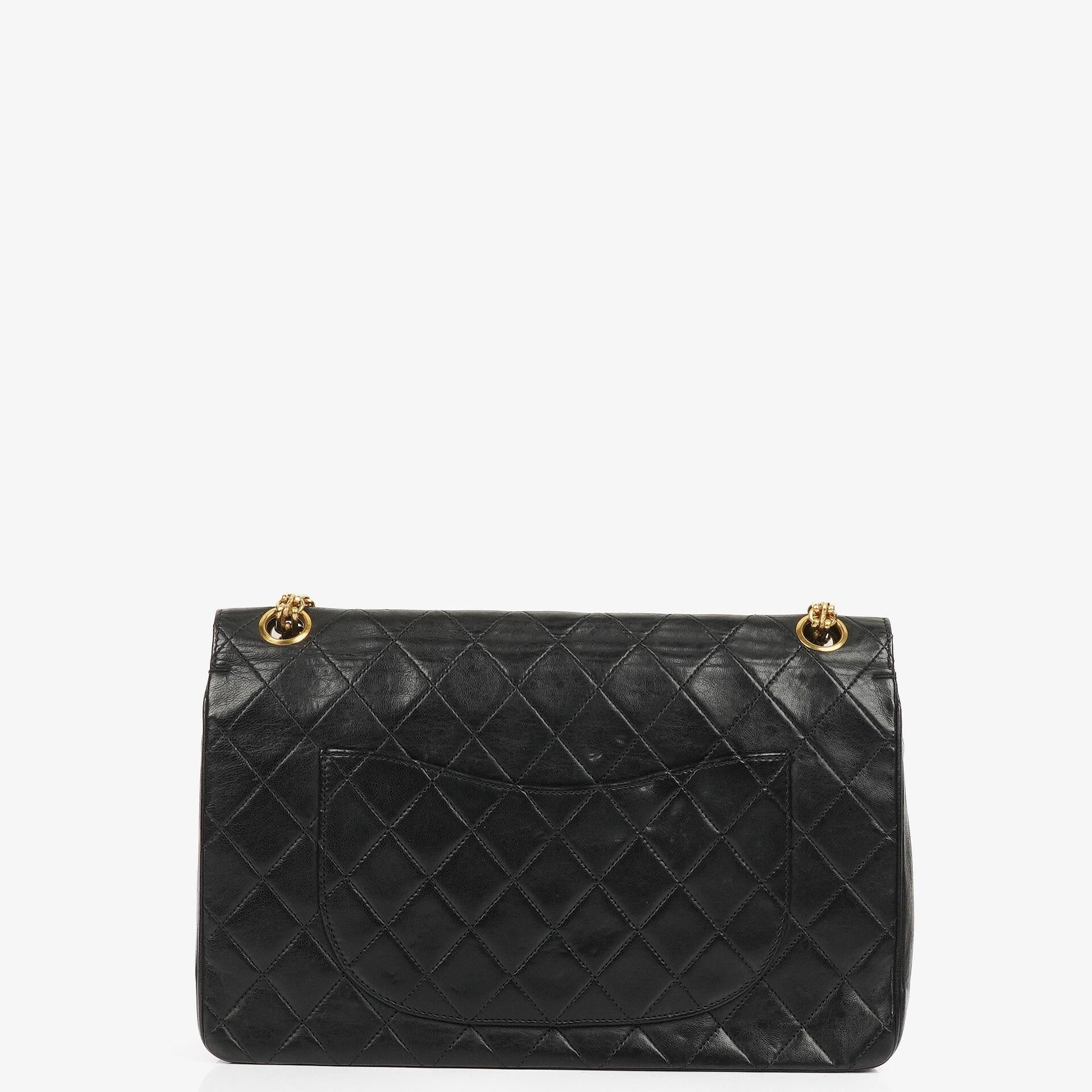 Chanel Vintage Medium Timeless Classic Double Flap Bag In Black Quilted Lambskin With 24K Gold-Plated Hardware And Mademoiselle Chain