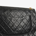 Chanel Vintage Medium Timeless Classic Double Flap Bag In Black Quilted Lambskin With 24K Gold-Plated Hardware And Mademoiselle Chain