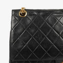 Chanel Vintage Medium Timeless Classic Double Flap Bag In Black Quilted Lambskin With 24K Gold-Plated Hardware And Mademoiselle Chain