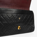 Chanel Vintage Medium Timeless Classic Double Flap Bag In Black Quilted Lambskin With 24K Gold-Plated Hardware And Mademoiselle Chain