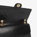 Chanel Vintage Medium Timeless Classic Double Flap Bag In Black Quilted Lambskin With 24K Gold-Plated Hardware And Mademoiselle Chain