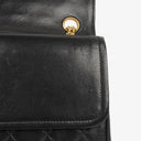 Chanel Vintage Medium Timeless Classic Double Flap Bag In Black Quilted Lambskin With 24K Gold-Plated Hardware And Mademoiselle Chain