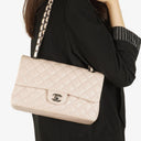 Chanel   Medium Timeless Classic Double Flap Bag Ivory Caviar Quilted Lambskin Silver Plated Hardware