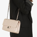 Chanel   Medium Timeless Classic Double Flap Bag Ivory Caviar Quilted Lambskin Silver Plated Hardware