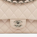 Chanel   Medium Timeless Classic Double Flap Bag Ivory Caviar Quilted Lambskin Silver Plated Hardware