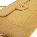Chanel Vintage Small Camera Tassel Bag In Gold Quilted Suede With CC Logo Front Pocket