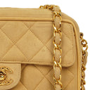 Chanel Vintage Small Camera Tassel Bag In Gold Quilted Suede With CC Logo Front Pocket